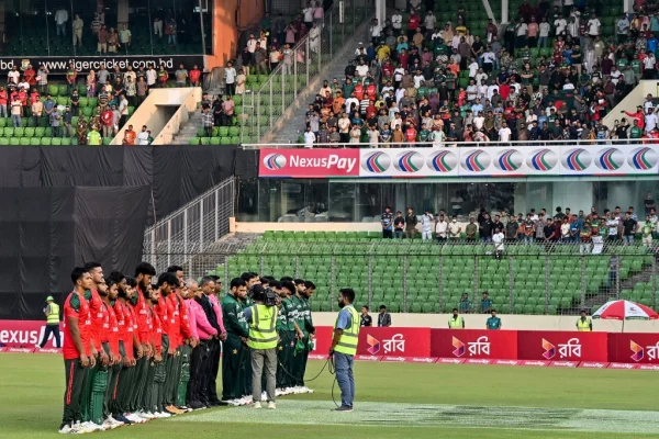 Bangladesh and Pakistan team players observe a minute's silence for victims of a fighter jet crash, before the start of the second T20I at the Sher-e-Bangla National Cricket Stadium in Dhaka on Tuesday (AFP) Milestone
