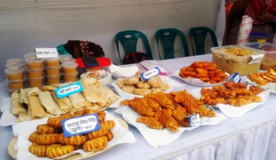Different types of rice cakes on display at a stall in the Poush Mela in Barisal | Dhaka Tribune