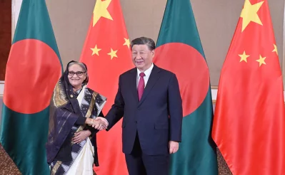 Prime Minister Sheikh Hasina and Chinese President Xi Jinping exchange greetings before their talks at Hilton Hotel in Johannesburg, South Africa on Wednesday, August 23, 2023. Photo: Focus Bangla