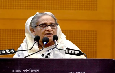 Prime Minister Sheikh Hasina addresses a discussion arranged by the Bangladesh Awami League in Dhaka on Friday, November 3, 2023. Photo: PMO