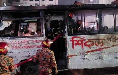 A Shikor Paribahan bus is torched on the first day of a two-day nationwide strike called by BNP in the capital`s Mirpur road 11.5 on Sunday, November 5, 2023. Photo: Dhaka Tribune