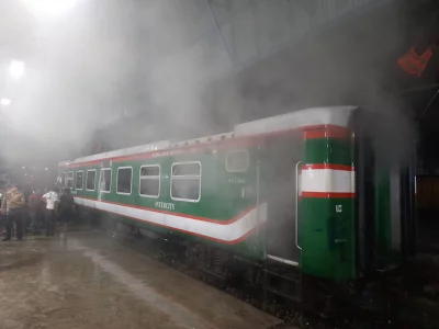 The image shows firefighters trying to douse the fire on a train in Sylhet on Wednesday, November 22, 2023. Photo: Dhaka Tribune