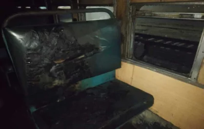 A train is set ablaze in the Ishwardi Junction Railway Station in Pabna on Monday, November 27, 2023. Photo: Dhaka Tribune