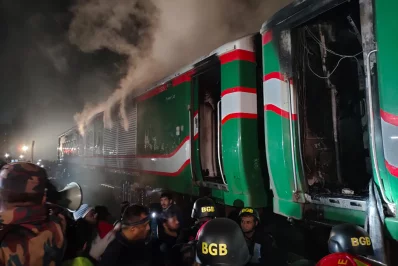 Smoke coming out of the Benapole ExpressTrain that was set on fire on Friday, January 5, 2024. Photo: Mahmud Hossain Opu/Dhaka Tribune
