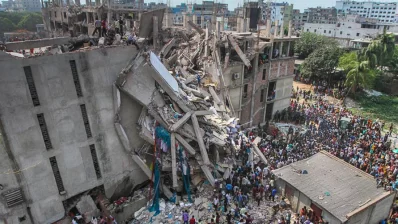 File image of the collapsed Rana Plaza on April 24, 2013. Photo: Collected