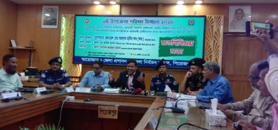 The image shows Election Commissioner Ahsan Habib addressing a view exchange meeting in Pirojpur on Saturday, April 27, 2024. Photo: Dhaka Tribune