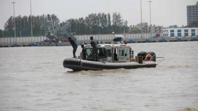 Members of the Bangladesh Navy during the rescue operation of the Bangladesh Air Force Yak-130 jet trainer, that crashed in Patenga, Chittagong, on Thursday, May 9, 2024. Photo: Dhaka Tribune