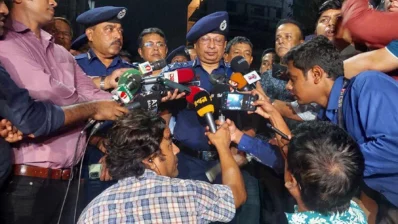 Inspector General of Police (IGP) Chowdhury Abdullah Al-Mamun speaks to journalists after visiting a spot where a constable was killed by another policeman in Baridhara, Dhaka on Sunday, June 9, 2024. Photo: Bangla Tribune