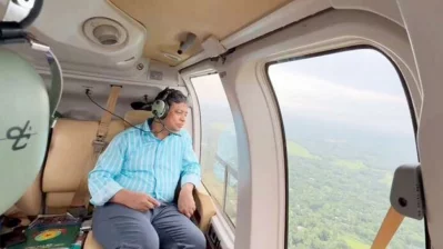 The image shows DB chief Harunor Rashid overseeing the search and arrest operation from a helicopter in Khagrachhari hill tracts region on Wednesday. Photo: Collected