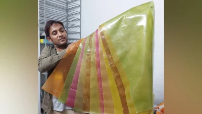 Mahbub Sumon holding his biodegradable plastic. Photo: Courtesy