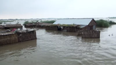 The houses are inundated with water amid the worsening situation of floods in Jamalpur. Photo: Dhaka Tribune