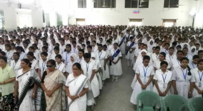 Former and current students and teachers of Holy Cross College in Dhaka recently gathered to pay tribute to two of the institution’s former principals. Photo: Bangla Tribune