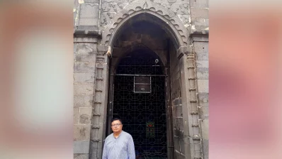 Writer at the entry of Kusumba Mosque. Photo: Dhaka Tribune