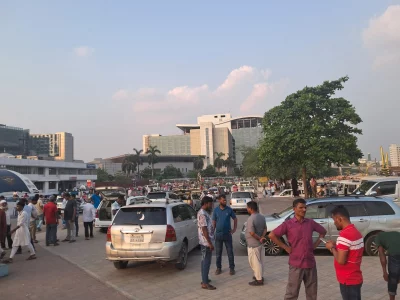 Large crowds of passengers’ relatives, dust, and weak enforcement create chaotic conditions at Hazrat Shahjalal International Airport.