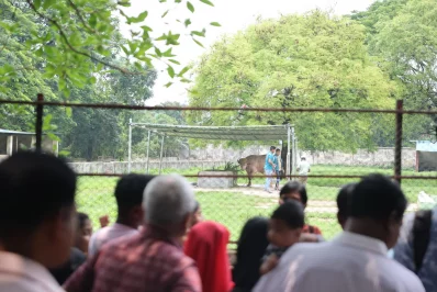 Holidaymakers crowd the enclosure of the rare pink albino buffalo ‘Donald Trump’ at Mirpur National Zoo during Eid-ul-Azha celebrations. Photo: Dhaka Tribune