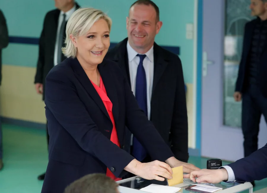 Marine Le Pen, French National Front (FN) political party candidate for French 2017 presidential election, casts her ballot in the second round of 2017 French presidential election at a polling station in Henin-Beaumont, France, May 7, 2017. REUTERS/Charles Platiau