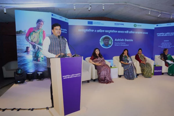 Ashish Damle, country director for Oxfam in Bangladesh, addresses the 'Informal & Marginalized Formal Women Workers Convention 2025' in the capital on Tuesday, December 8, 2025. Photo: Courtesy Oxfam event Day 1 (4)