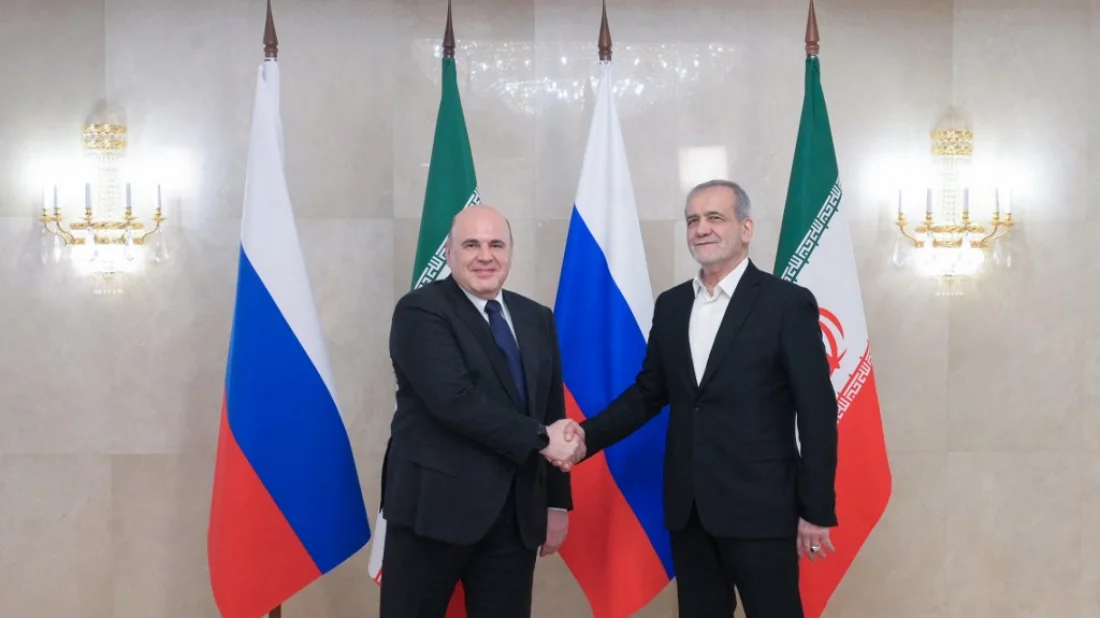 In this pool photograph distributed by the Russian state agency Sputnik, Russia's Prime Minister Mikhail Mishustin meets with Iran's President Masoud Pezeshkian in Moscow on January 17, 2025. Photo: AFP