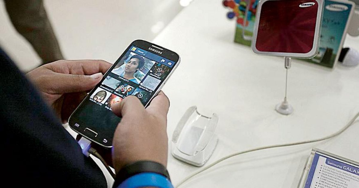 1 surcharge imposed on mobile phone handsets import