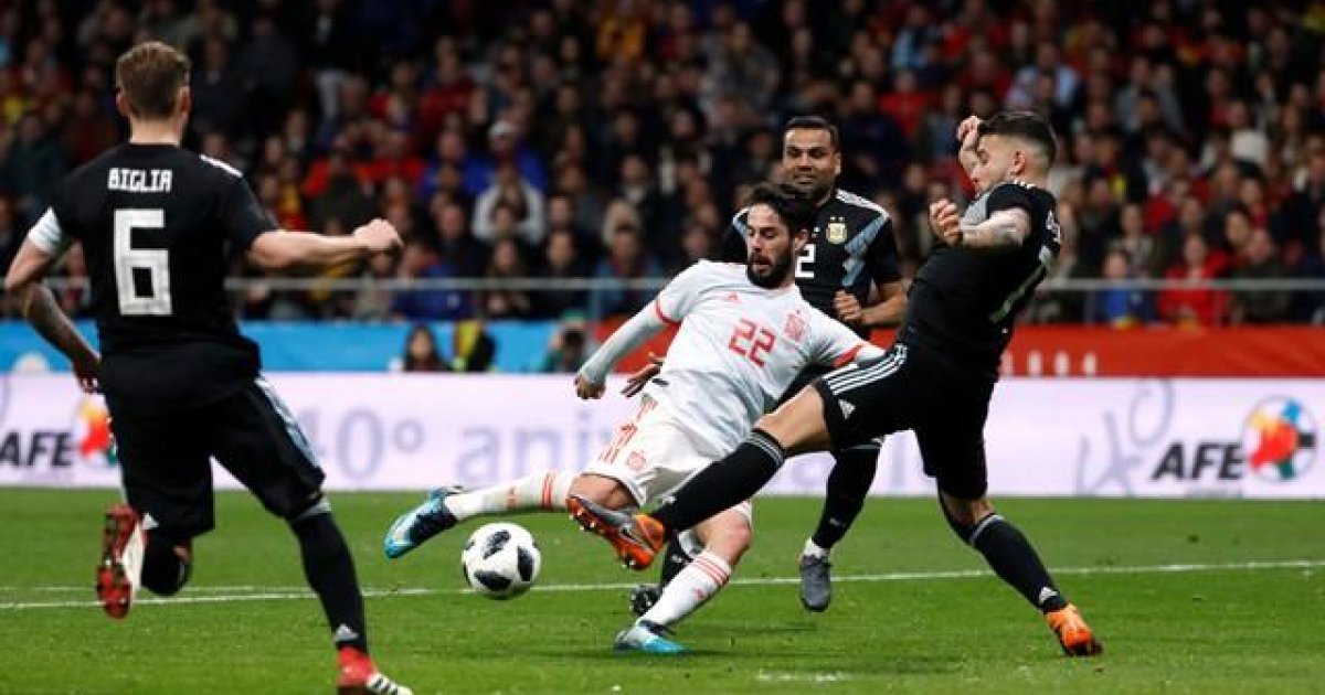 Champion Spain squeezes Greece out in penalty shootout