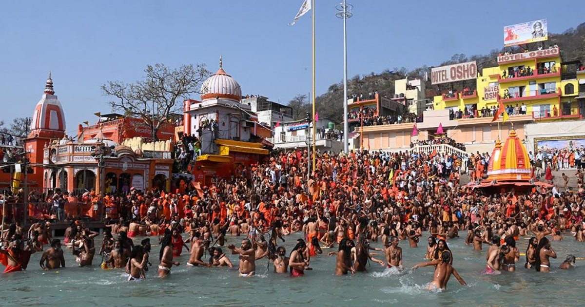 Hundreds Of Thousands Take Holy Dip In India