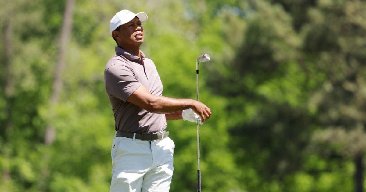 Woods a cut above, sets another Masters record