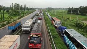 Traffic slows to a crawl as truck overturns on Dhaka-Tangail highway
