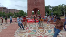 JU teachers, students hold protest procession singing songs