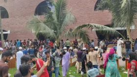 Cheering youths seize JS building, loot furniture of Ganabhaban