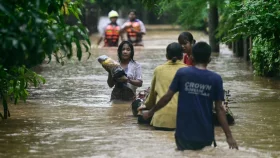 Flash floods kill 18 in typhoon-hit Myanmar