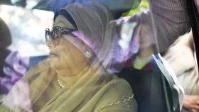 Khaleda lands in Dhaka