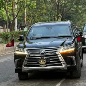 PM Tarique uses national flag on official car for first time
