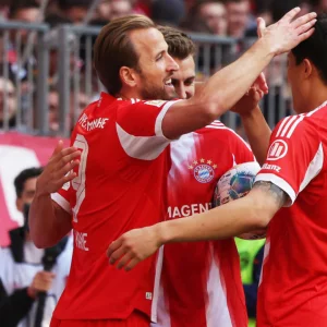 Kane scores as record-breaking Bayern sink Stuttgart to claim Bundesliga title