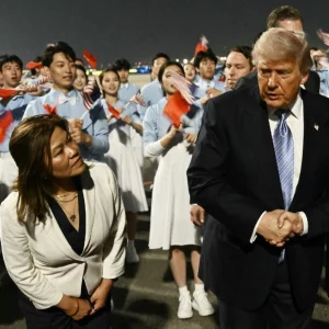 Trump arrives in China for superpower summit with Xi