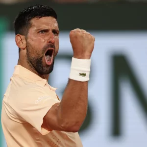 Djokovic fights through tough Roland Garros opener, Zverev strolls