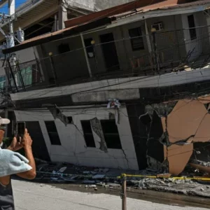 Outdoor hospitals, shaken communities as Philippin