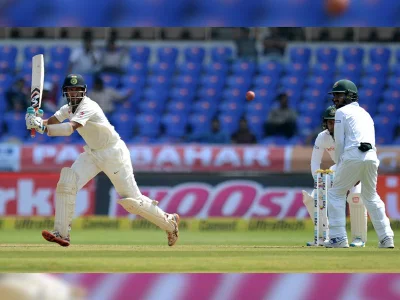 Indias Cheteshwar Pujara plays a shot during the first day of the Test cricket match between India and Bangladesh at The Rajiv Gandhi International Cricket Stadium in Hyderabad on February 9, 2017AFP