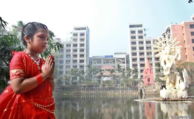 Saraswati is an embodiment of universal, divine and eternal knowledge. A girl dressed like Devi Saraswati in front a statue of Swaraswati at Dhaka Universitys Jagannath Hall pond on Monday | Focus Bangla