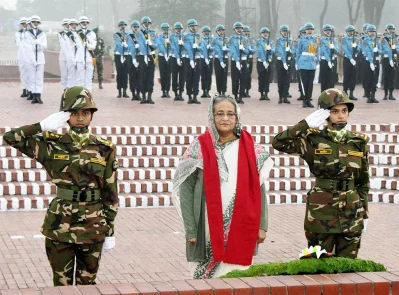 Prime Minister Sheikh Hasina observes a moment of silence after placing a floral wreath as tribute to the martyrs of the Liberation War  at the National Memorial to mark the 47th Victory Day of Bangladesh | Focus Bangla
