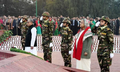 President Abdul Hamid and Prime Minister Sheikh Hasina observe a moment of silence after placing floral wreaths as tribute to the martyrs of the Liberation War at the National Memorial to mark the Victory Day of Bangladesh | Focus Bangla