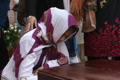 A woman cannot hold back her emotion seeing the coffin of her loved one who was killed in the plane crash on March 12, 2018 | Rajib Dhar/Dhaka Tribune