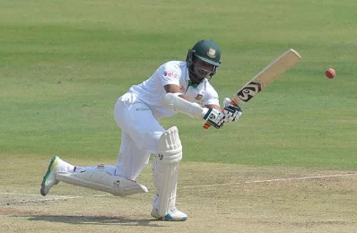 Bangladeshs Shakib Al Hasan plays a shot on the third day of a solo Test match between India and Bangladesh at the Rajiv Gandhi International Cricket Stadium in Hyderabad on February 11, 2017/AFP PHOTO 