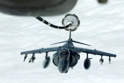 A US Marines Harrier AV-8B makes its way to a fueling boom suspended from a US Air Force KC-10 Extender during mid-air refueling support to Operation Inherent Resolve over Iraq and Syria air space, March 15, 2017rnrnREUTERS