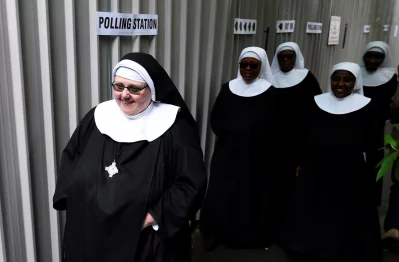 Nuns arrive to vote at a polling station in Hyde Park, London, Britain June 8, 2017rnREUTERS