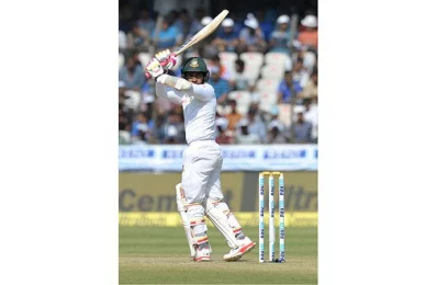 Bangladeshs captain Mushfiqur Rahim plays a shot on the third day of the only Test match between India and Bangladesh at the Rajiv Gandhi International Cricket Stadium in Hyderabad on February 11, 2017/AFP PHOTO 