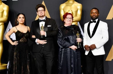 (L-R) Actor Salma Hayek, director Kristof Deak and producer Anna Udvardy, winners of Best Live Action Short Film for Sing and actor David Oyelowo pose in the press room during the 89th Annual Academy Awards at Hollywood &amp; Highland Centre on February 26, 2017 in Hollywood, California/AFP