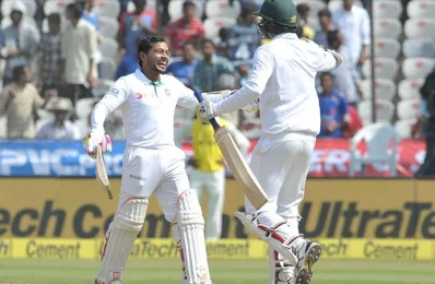 Bangladeshs captain Mushfiqur Rahim celebrates after scoring century (100 runs) on the fourth day of a solo Test match between India and Bangladesh at the Rajiv Gandhi International Cricket Stadium  on February 12, 2017/AFP PHOTO