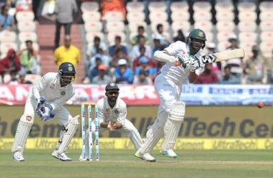 Bangladeshs Shakib Al Hasan plays a shot on the third day of a solo Test match between India and Bangladesh at the Rajiv Gandhi International Cricket Stadium in Hyderabad on February 11, 2017/AFP PHOTO 
