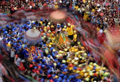 Nepalese devotees participate in the Panch Areh chariot festival in Kathmandu, Nepal, Tuesday, March 28, 2017. Three different chariots of Hindu deities Kankeshwori, Shankata and Bhadrakali are taken through the streets during the festival celebrated by Nepals Newar CommunityrnrnAP