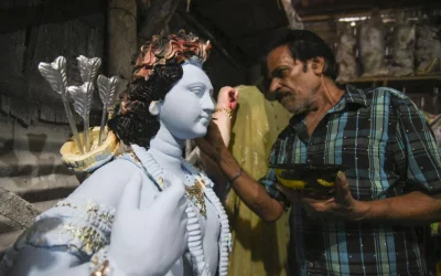 An artisan paints an idol of Karthik in his workshop, in Chittagong | Anwar Hussain/Dhaka Tribune